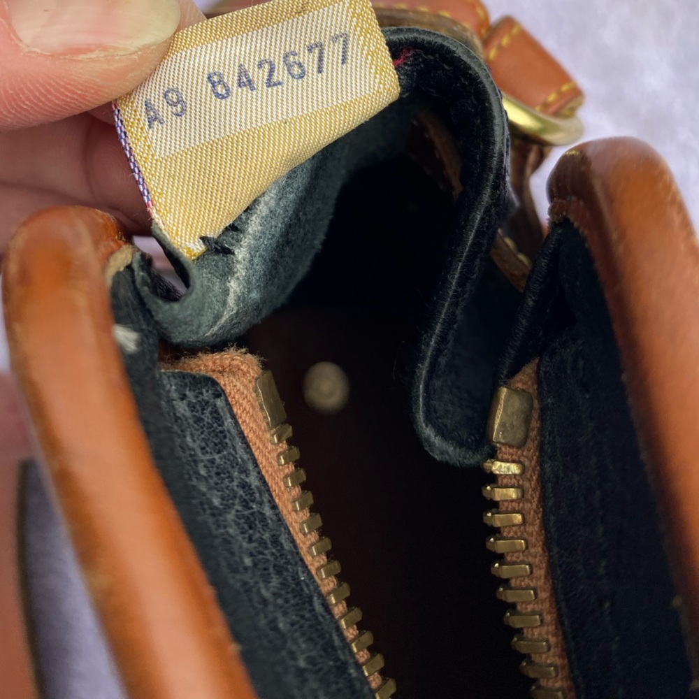 Vintage Black Dooney and Bourke Black with Tan Trim Zip Top Buckle Shoulder‎ Bag - Picture 11 of 11